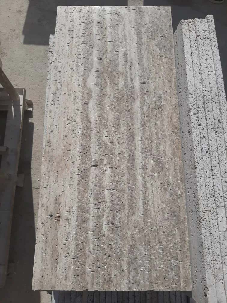 Travertine slabs with natural pitting and veining
